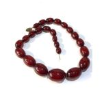 Antique cherry amber / bakelite bead necklace largest bead measures approx 2.9cm by 2.1cm weight 63g