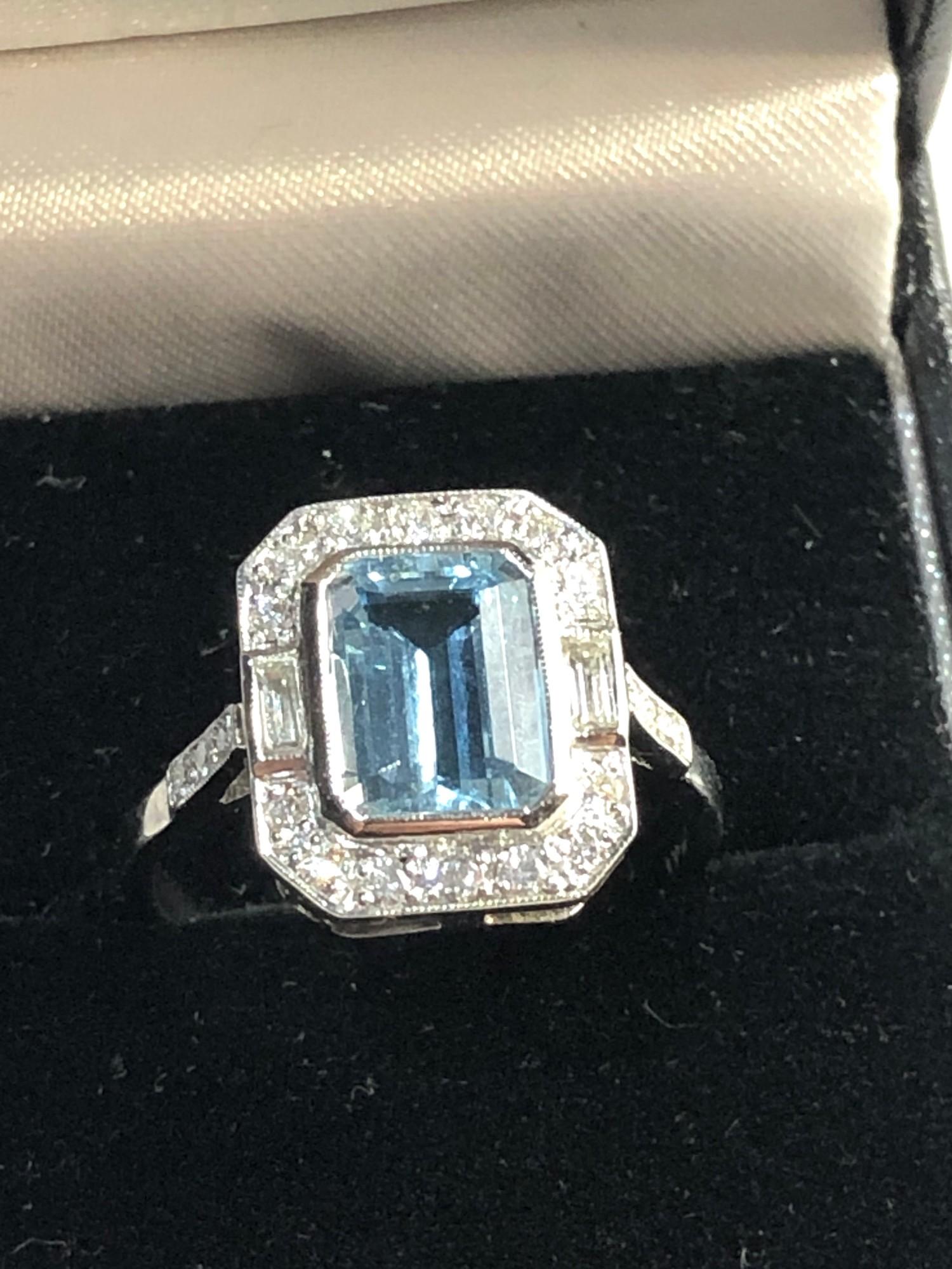 Platinum diamond and aquamarine ring central aquamarine is 2.28ct with approx 0.50ct diamonds