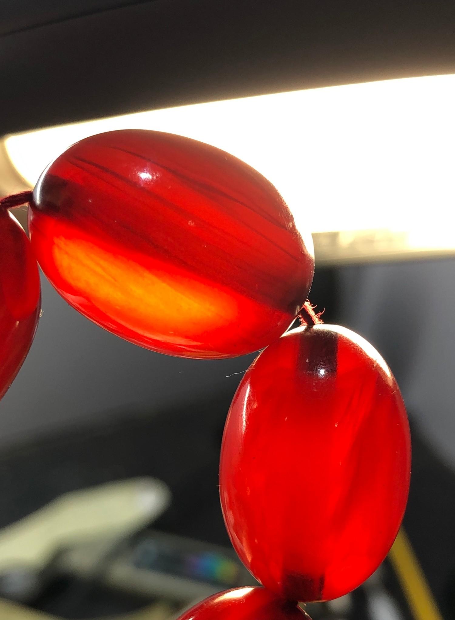 Antique cherry amber / bakelite bead necklace largest bead measures approx 3.1cm by 2.3cm weight 90g - Image 3 of 4