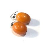Egg yolk amber bead earring weight 5.1g good condition each bead measures approx 19mm by 15mm