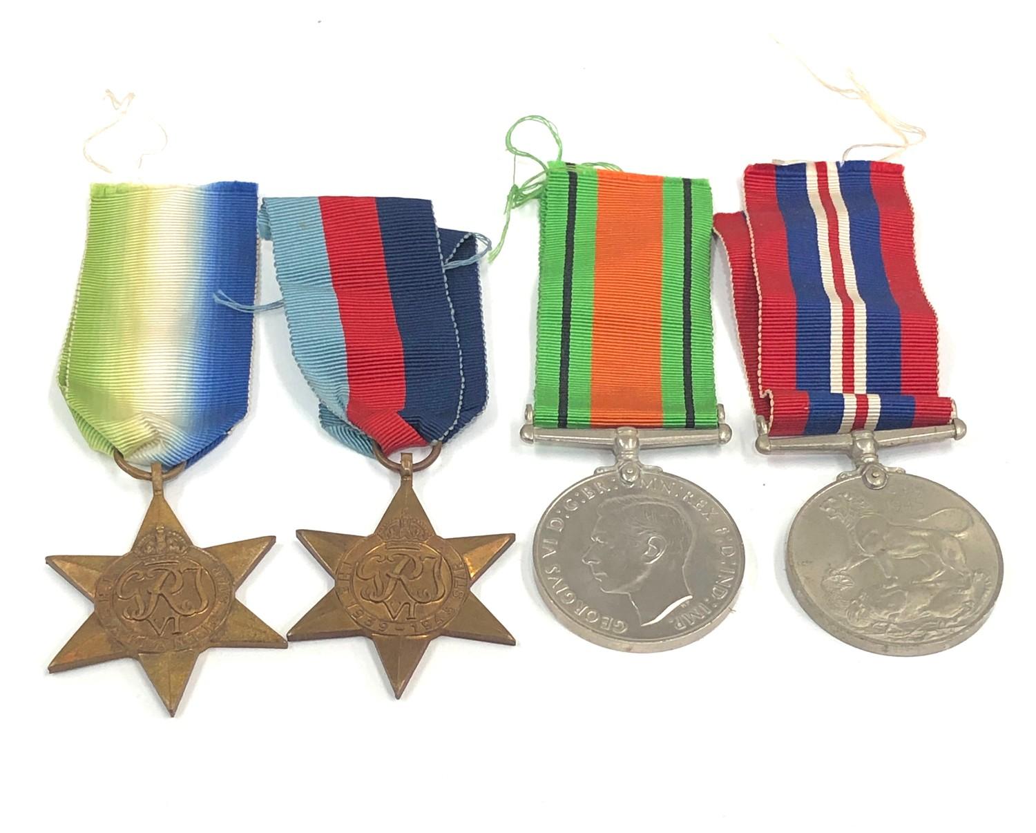 4 ww2 medals and ribbons includes the atlantic star