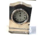 Vintage silver pocket watch stand clock design hallmarks worn age related wear marks and dents