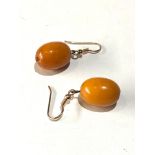 Antique egg yolk amber bead earrings each bead measures approx 18mm by 14mm weight 4.6g
