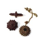 Selection of antique garnet jewellery brooches and pendant .the largest brooch measure approx 3.