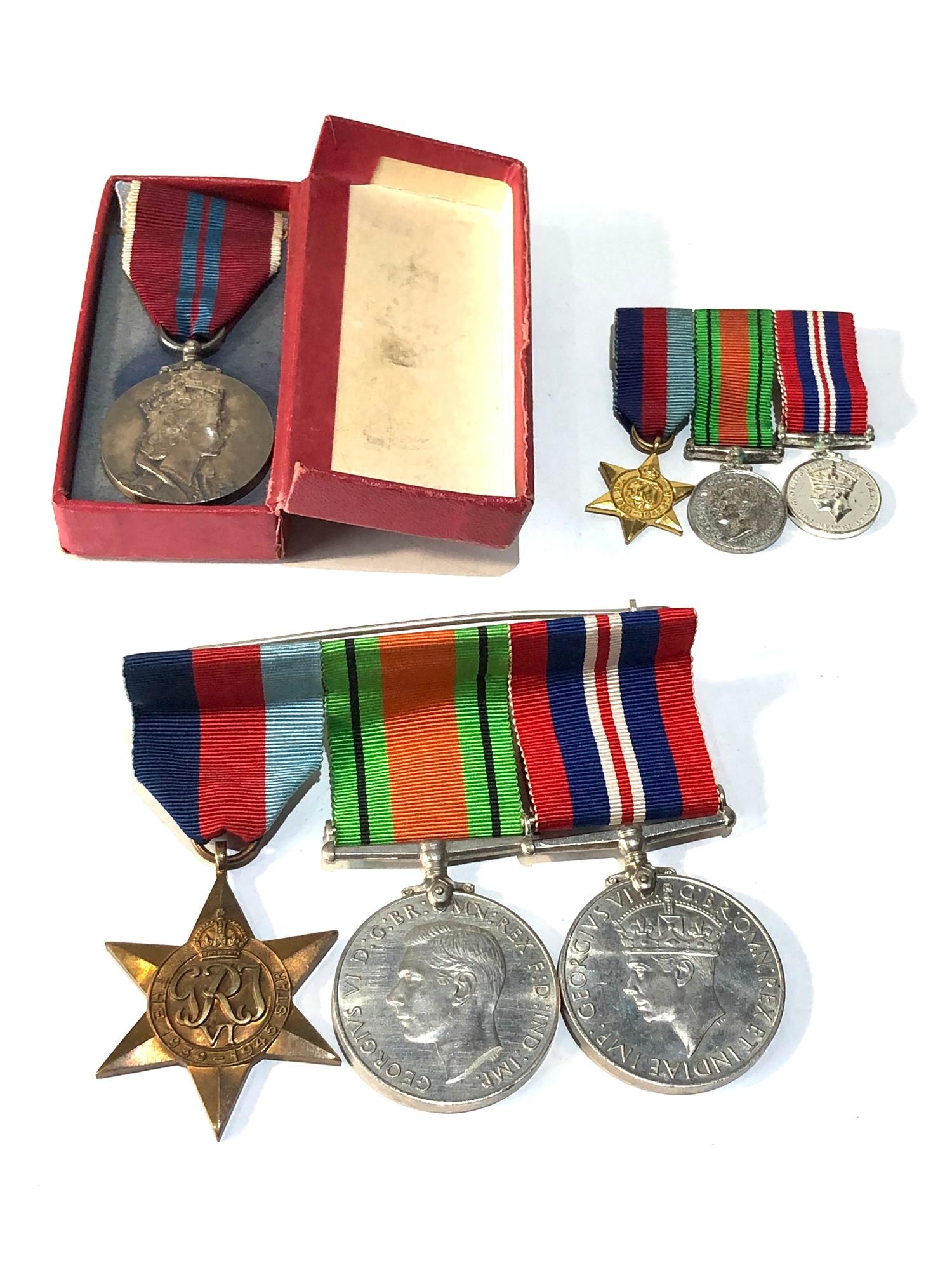 ww2 and 1953 coronation medals and ww2 matching miniatures