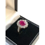 Fine 18ct gold diamond and ruby ring central ruby is 2.78ct with approx 1ct diamonds around .