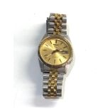 Seiko 5 automatic 7009-3110 watch is in working order but no warranty is given overall good