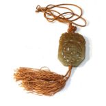 Vintage jade pendant measures approx 5.7 by 4.1 cm with silk tassels and silk chain