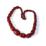 Antique cherry amber / bakelite barrel shaped bead necklace largest bead measures approx 2.5cm by