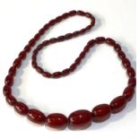 Antique cherry amber / bakelite bead necklace largest bead measures approx 2.5cm by 1.7cm weight 44g