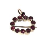 Antique gold and table cut garnet set brooch / pendant measures approx 3cm by 3.2 cm drop weight 5.