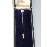Antique gold and opal stick pin