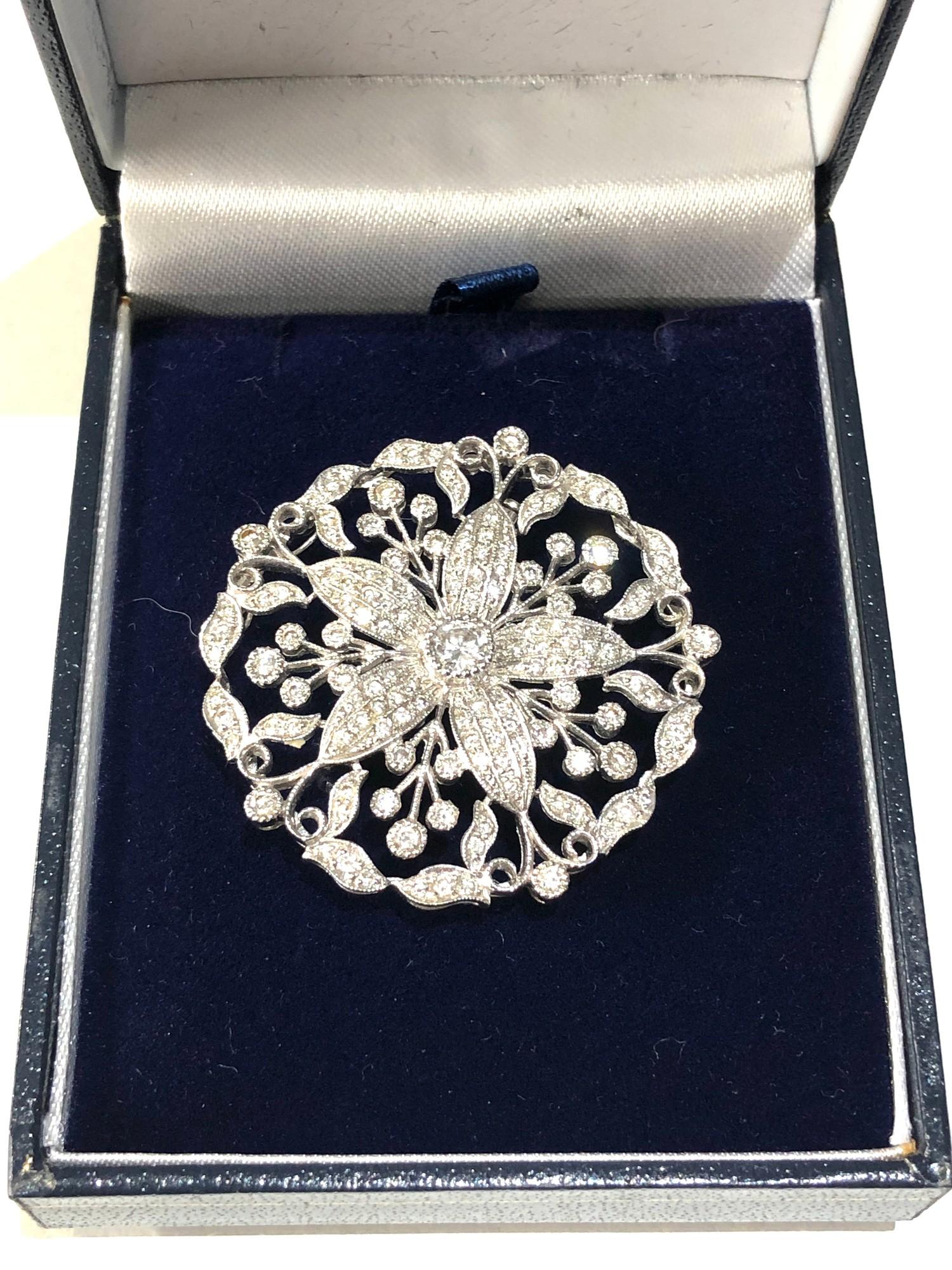 Fine antique white gold / plat floral diamond pendant pin brooch central diamond measures approx 4mm