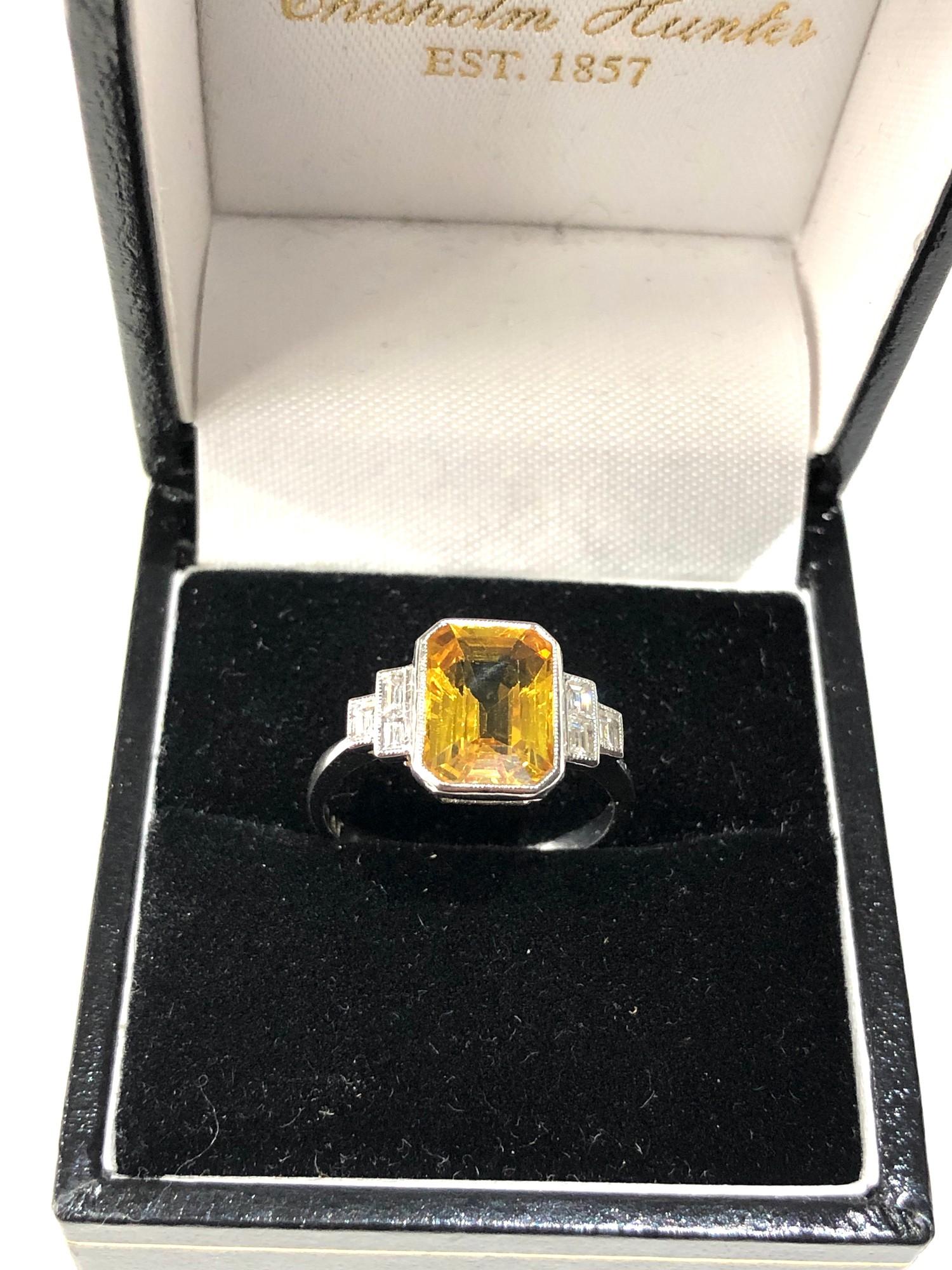 Fine platinum diamond and yellow sapphire ring central yellow sapphire measures approx 11mm by 7mm