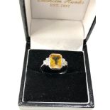 Fine platinum diamond and yellow sapphire ring central yellow sapphire measures approx 11mm by 7mm