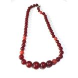 Cherry amber bakelite round bead necklace 5 beads are not bakelite and are lighter colour some beads