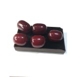 5 large cherry amber / bakelite beads measure approx 30mm by 22mm weight 52g good internal swirls