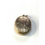 Antique gold bk - front locket measures approx 3cm by 2.2cm