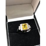 Fine platinum diamond and yellow sapphire ring central yellow sapphire measures approx 7mm by 5.5mm