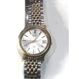 Vintage gents Seiko automatic 17 jewel 7005-711o watch is ticking but no warranty is given glass