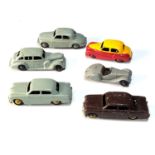 Selection of vintage Dinky cars played worn condition