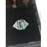 Fine diamond and Aquamarine ring large central aqua is 2.40 ct with diamonds around set in platinum