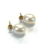 14ct gold diamond and pearl earrings pearl measures approx 1.1cm by 0.9cm with small diamond above