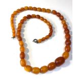 Antique egg yolk amber bead necklace weight 32g