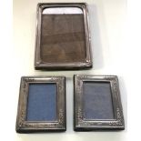 3 silver picture frames largest measures approx 20cm by 14cm