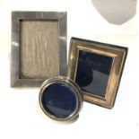 3 silver picture frames largest measures approx 17cm by 12.5cm