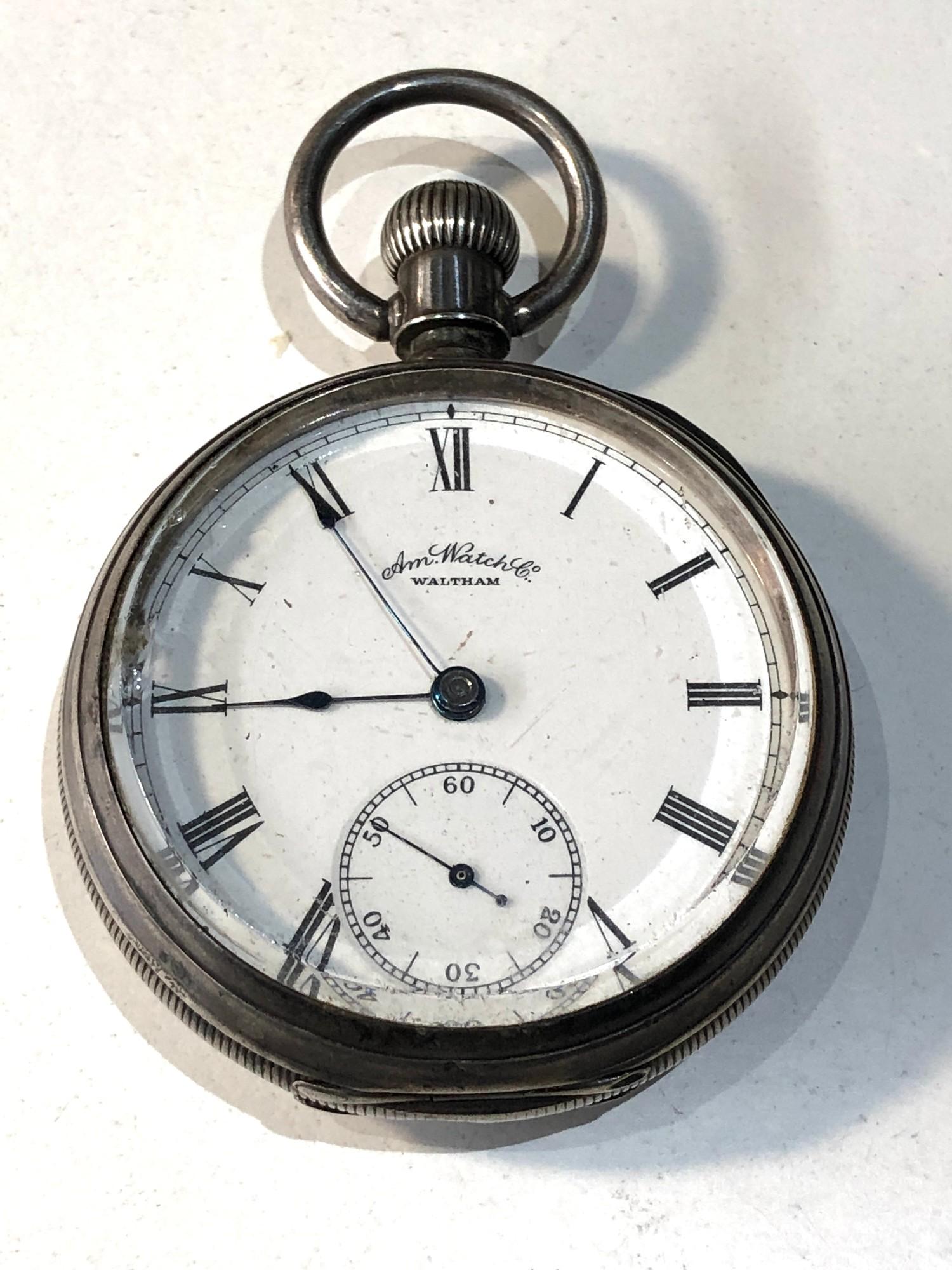 Antique silver cased Am watch Co waltham pocket watch balance will spin does not tick keeps
