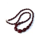 Antique cherry amber / bakelite bead necklace good internal streaking weight 45g