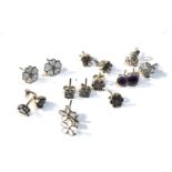 8 pairs of silver Pandora earrings in uncleaned condition