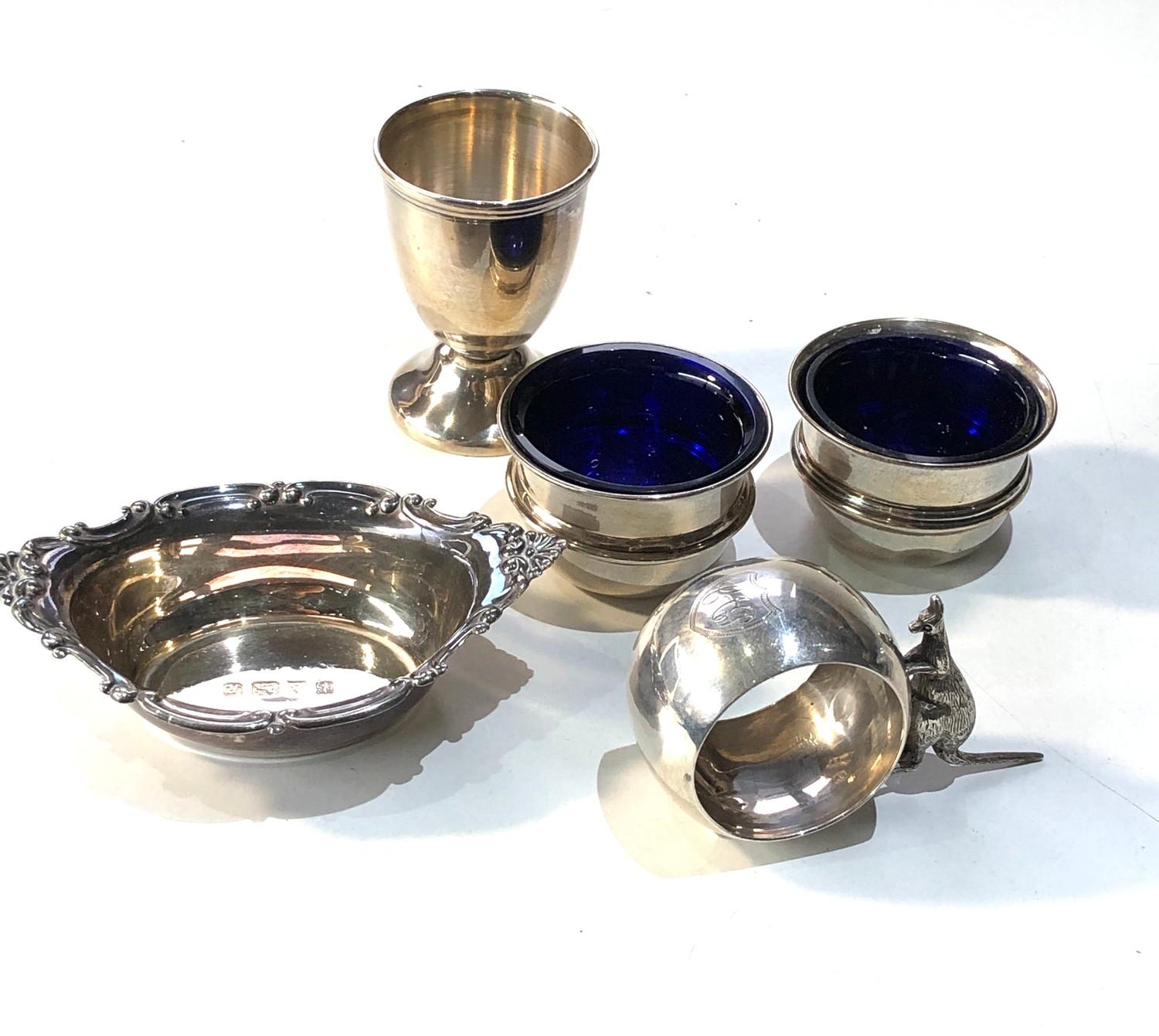 Selection of silver items included pair silver salts egg cup small sweet dish and kangaroo napkin