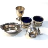 Selection of silver items included pair silver salts egg cup small sweet dish and kangaroo napkin