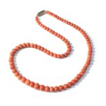 Antique coral bead necklace graduated largest coral bead measures approx 9mm by 7mm total weight 33g