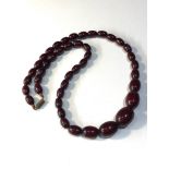 Antique cherry amber / bakelite bead necklace weight31g good internal streaking