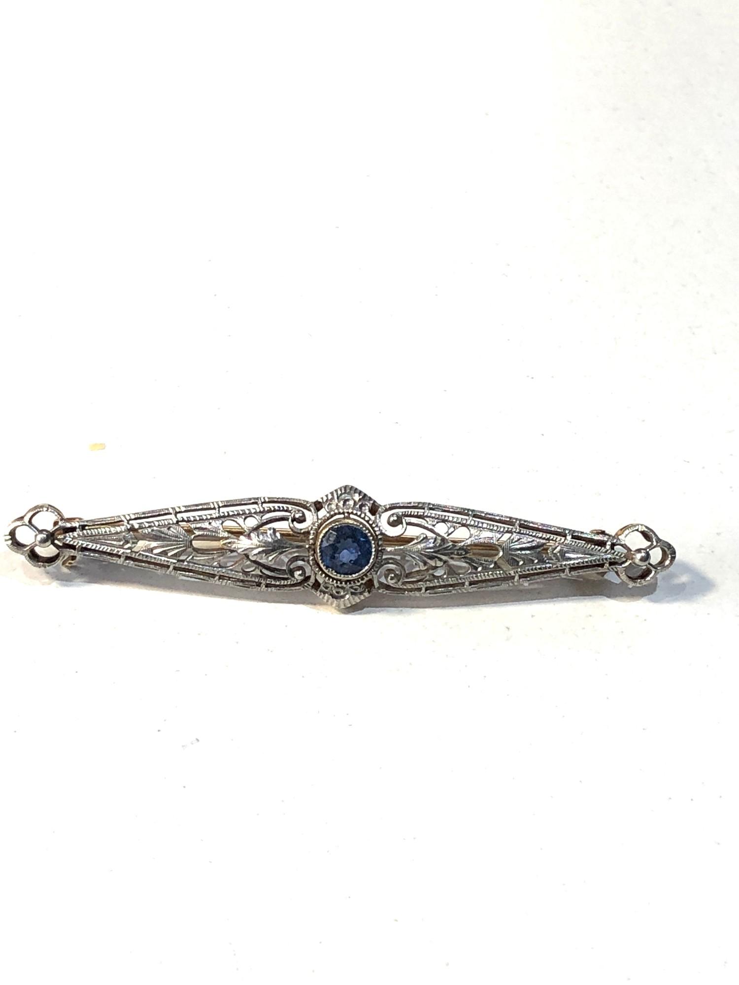 Vintage 14ct gold and platinum sapphire brooch measures approx 5.3cm by 1cm weight