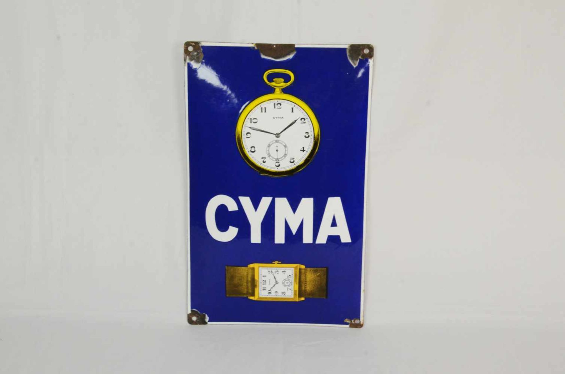 Curved enamel sign CYMAThis curved CYMA enamel sign has 4 mounting holes and one smaller hole on