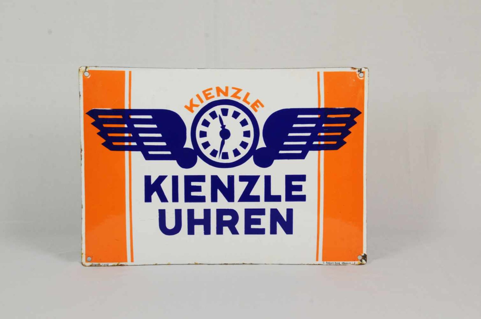 Curved enamel sign Kienzle UhrenThis curved Kinezle Uhren enamel sign is in German and has 4