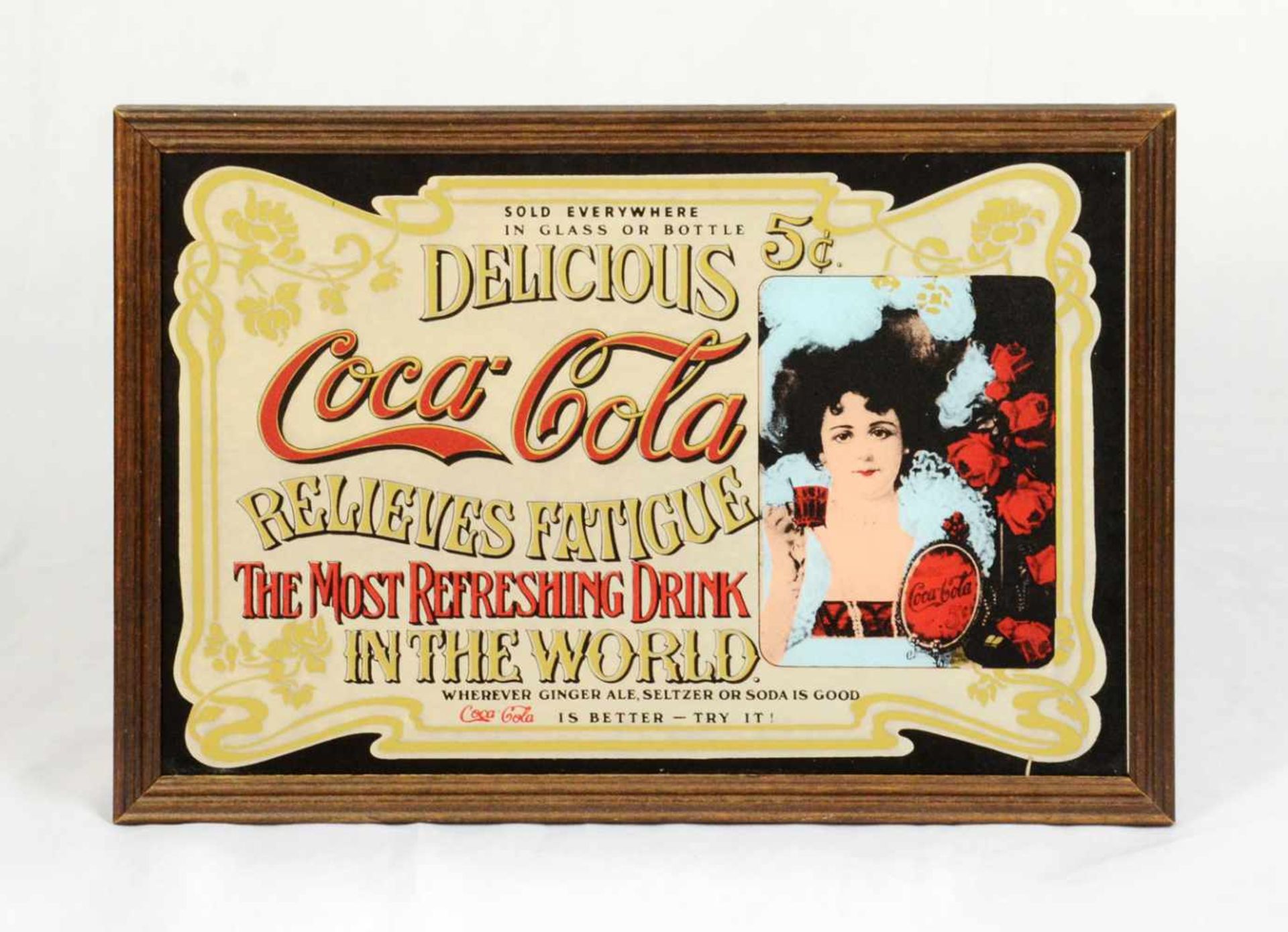 Advertisement on mirror "Delicious Coca-Cola"Advertisement printed on mirror - "Delicious Coca-Cola,