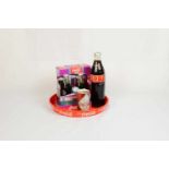 Set of 4 Coca-Cola itemsThis set of 4 Coca-Cola items contains - Coca-Cola tray in average