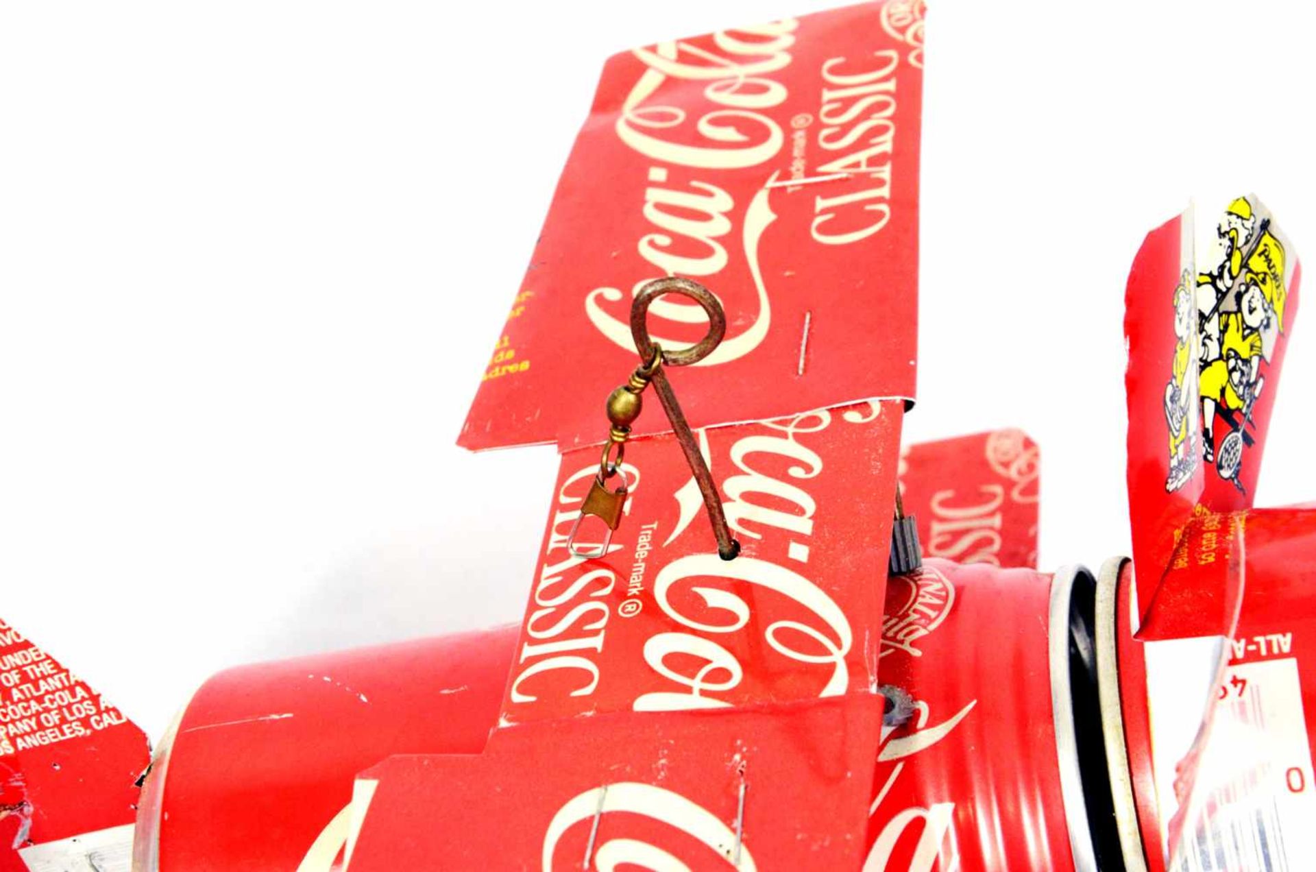 Hangable biplane toy made from Coca-Cola cansThis is a hangable biplane toy made from Coca-Cola - Bild 4 aus 4