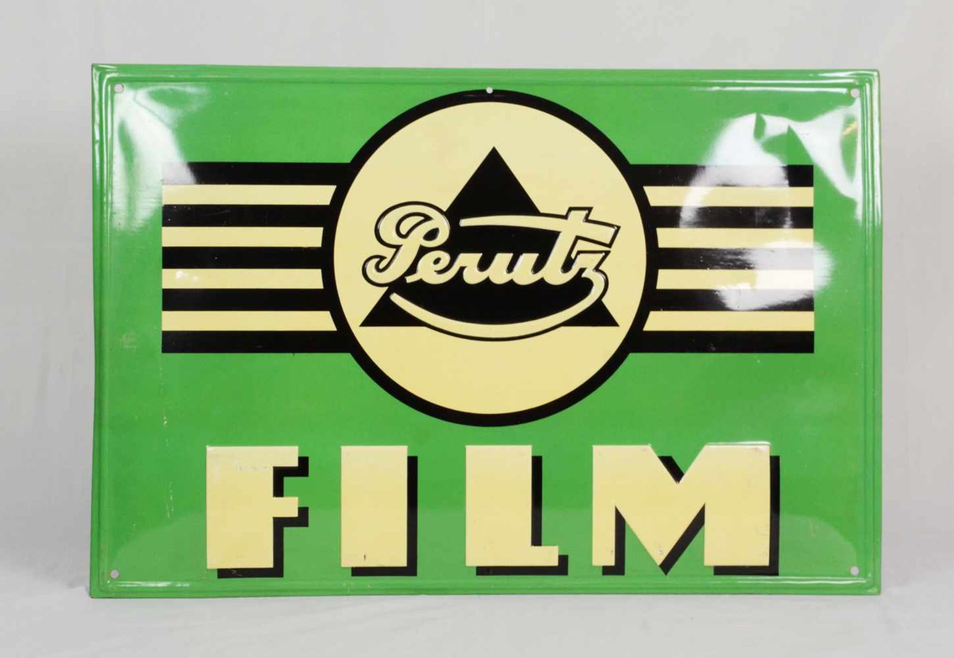 Curved metal sign Perutz FilmThis curved Perutz Film metal sign has 6 mounting holes. Overall very