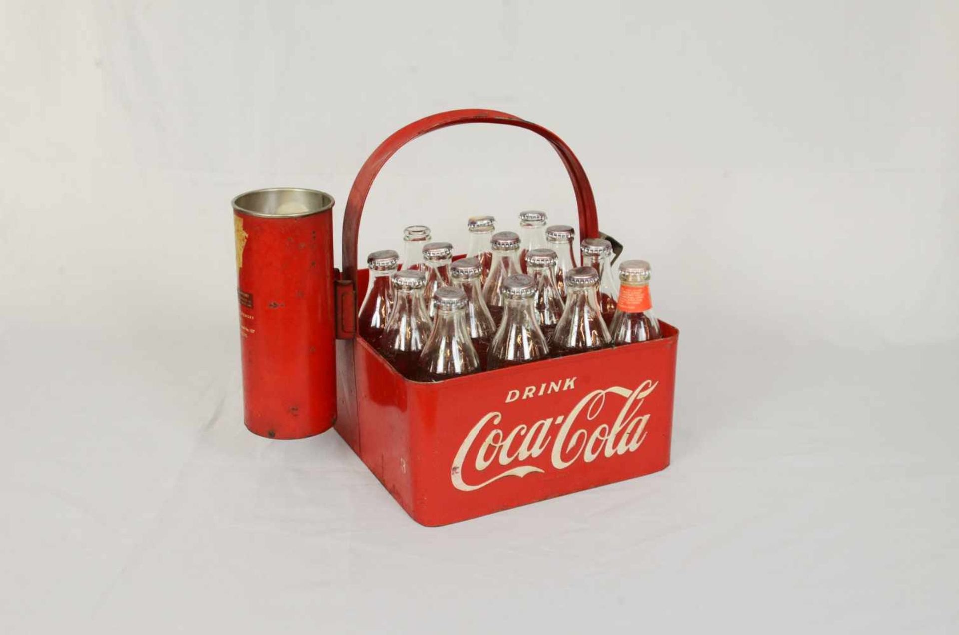 1950's Coca-Cola bottle carrier1950's Coca-Cola bottle carrier with bottle opener and inverted Dixie