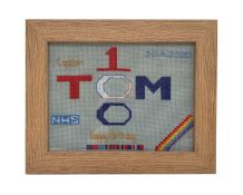 Framed birthday card needlework sampler