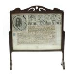 A 17th/18th century Indenture, now framed in a firescreen