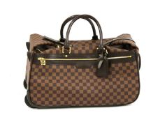 A Louis Vuitton Damier Ebène 'Eole 50' rolling duffle bag,