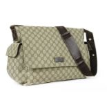 A Gucci canvas baby changing bag,