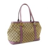 A Gucci beige monogrammed canvas medium 'Miss' tote